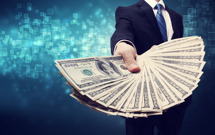bigstock-Business-Man-Displaying-Spread-47905169
